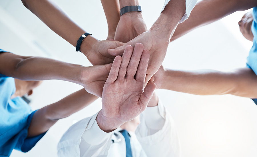 below-group-and-hands-stack-for-medical-staff