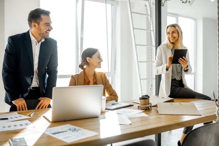 CX employees discussing results